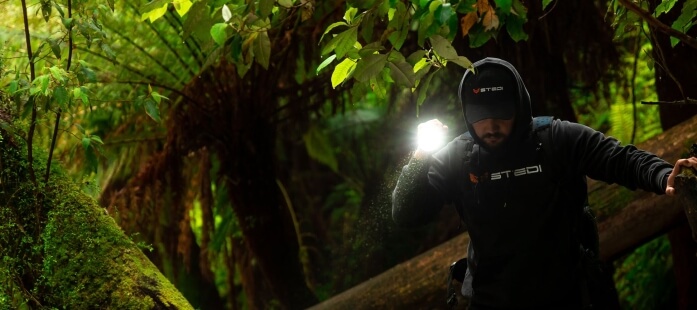 Man Hiking with STEDI FX3300 LED Torch